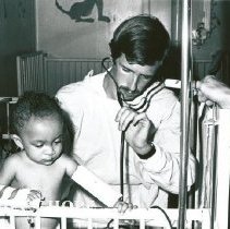 Dr Victor Lipp, Pediatrician, with young patient